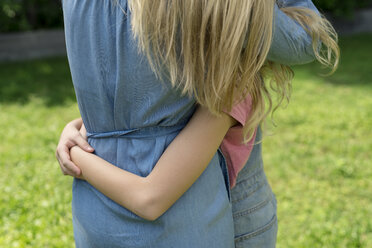 Mother and daughter hugging each other - SBOF01463