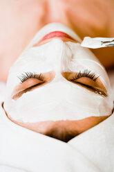 Woman is getting a face mask - CUF00786