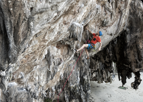 Thailand, Krabi, Lao liang island, climber in rock wall stock photo