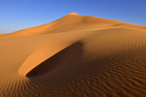Afrika, Algerien, Provinz Illizi, Wüste Sahara, Nationalpark Tassili n'Ajjer, Tadrart, Sanddünen von In Tehak, lizenzfreies Stockfoto