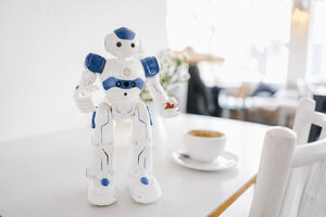 Miniature robot figurine holding strawberries - KNSF03894
