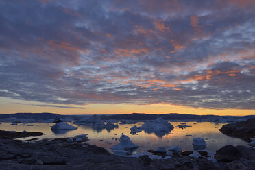 Greenland, East Greenland, view from Sarpaq over the icebergs of Sermilik fjord in the evening - ESF01651