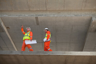 Workers walking at construction site - CUF01235