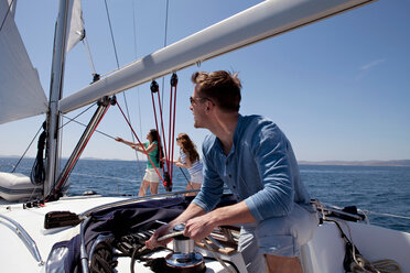 Team setting sail on yacht - CUF01578