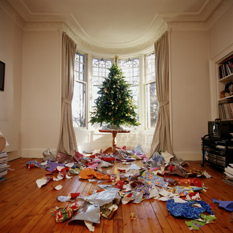 Messy living room at christmas stock photo