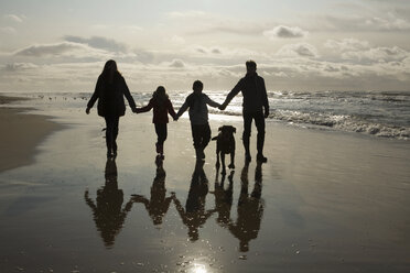 Family and dog by the sea - ISF00237