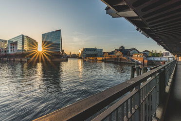 Germany, Hamburg, View to Ericusspitze and Deichtorhallen from Oberhafenbruecke at sunset - KEBF00824