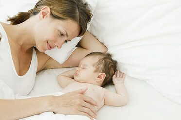 Mother watching baby sleep - ISF00763