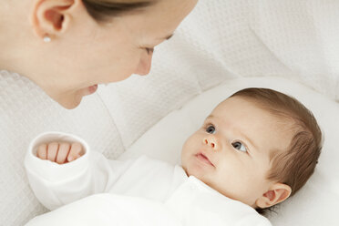 Mother with baby in bassinet - ISF00765