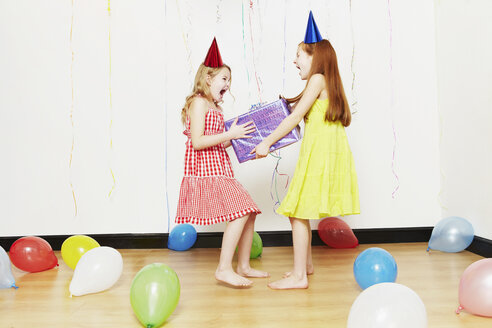 Girls fighting over birthday gift - ISF00788