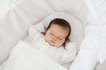 Baby sleeping in a bassinet - ISF00881