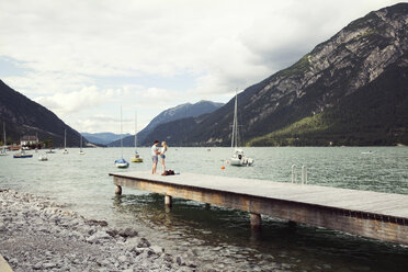 Couple on pier, Achensee, Innsbruck, Tirol, Austria, Europe - CUF01968
