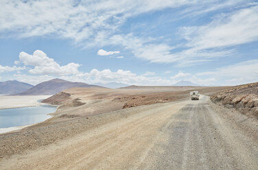 Recreational vehicle on empty road, Chiguana, Potosi, Bolivia, South America - CUF02295