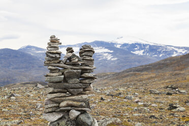 Stone cairn in mountain landscape, Jotunheimen National Park, Lom, Oppland, Norway - CUF02408