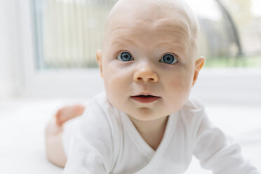 Crawling baby girl looking at camera - CUF03294