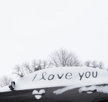 I love you written in snow on car windows - CUF03410