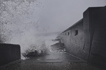 Water crashing against sea wall, Seaham Harbour, Durham, UK - CUF03594