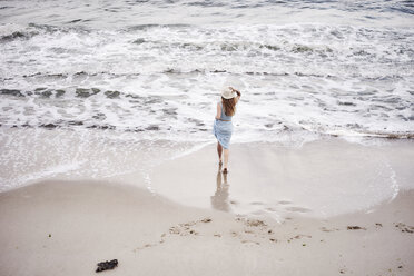 Woman on beach - CUF04122