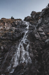 Waterfall moving down over rockface, Draja, Vaslui, Romania - ISF00926