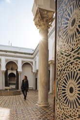 Woman exploring, Kasbah, Tangier, Morocco, North Africa - CUF04493