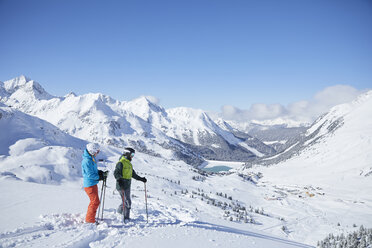 Austria, Tyrol, Kuehtai, two skiers in winter landscape - CVF00505