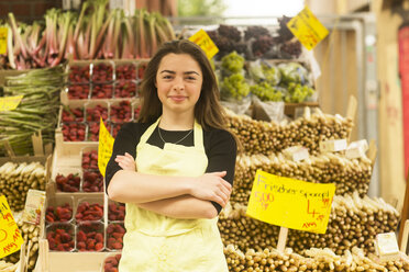 Portrait of young female fruit and veg stall trader - CUF04745