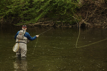 Man fishing in river - CUF04829