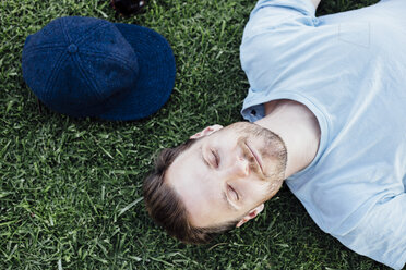 Man sleeping on grass - ISF01295