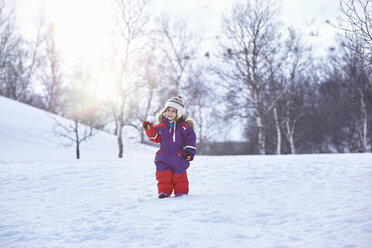 Portrait of young girl, standing in snowy landscape, Gjesdal, Norway - CUF05190