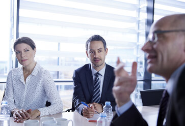 Businessman questioning during meeting - CUF06617