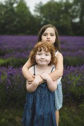 Sisters in lavender field, Campbellcroft, Canada - CUF07708