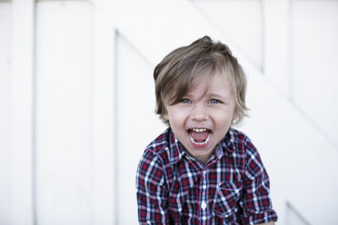 Portrait of cute boy in plaid shirt - ISF01595