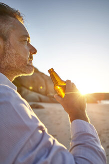 Man on beach - CUF07934