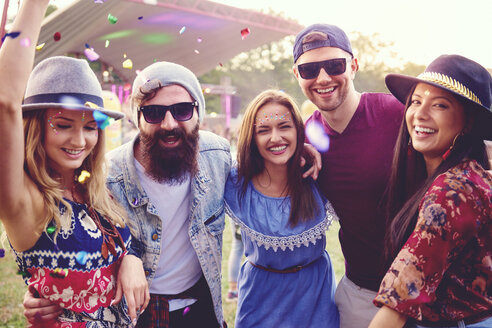 Portrait of young adult friends having fun at festival - ISF01766