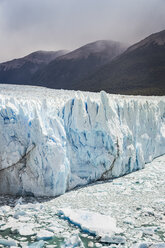 View of Perito Moreno Glacier and low cloud over mountains, Los Glaciares National Park, Patagonia, Chile - CUF08022