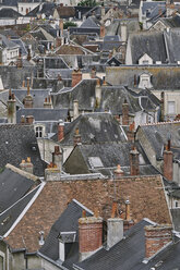 Elevated view of traditional townhouses and rooftops, Amboise, Loire Valley, France - CUF08151