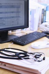 Stethoscope and medical records by computer - CUF08739