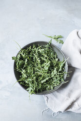 Studio shot, overhead view of rocket in bowl - CUF08916