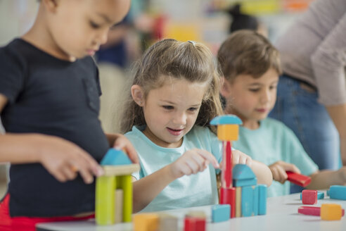 Children playing with building blocks in kindergarten - ZEF15430