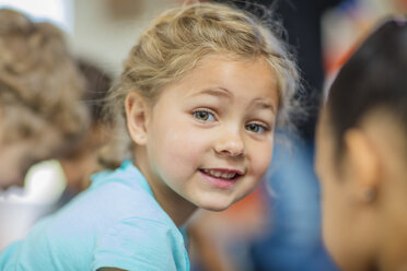 Portrait of smiling girl in kindergarten - ZEF15439