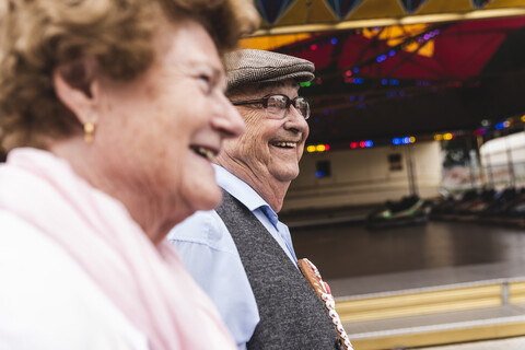 Happy senior couple on fair stock photo