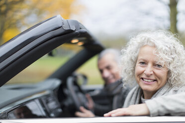 Portrait smiling senior couple in convertible - CAIF20518