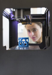 Female designer using 3D printer - CAIF20625