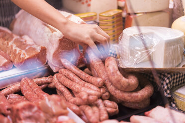 Female butcher with sausage - AFVF00450