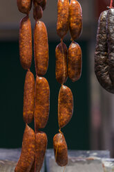 Sausage hanging in butchery - AFVF00453