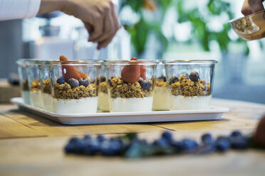 Chef preparing berry desserts, close-up - CUF10836