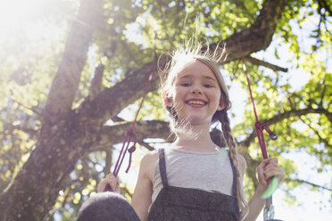 Girl on swing - CUF11312