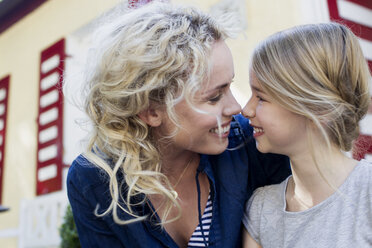 Mother and daughter enjoying being together outdoors - CUF11402