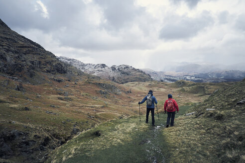Hikers on mountain, Coniston, Cumbria, United Kingdom - CUF11458