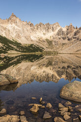 Mirror image of mountain landscape in Tonchek lake, Nahuel Huapi National Park, Rio Negro, Argentina - CUF11586